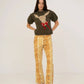 Jeans in denim con stampa cervo a gamba larga