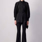 Camicia nera in cupro con maniche a pipistrello e cintura