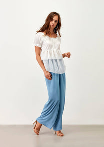 Blusa a balze bicolor con scollo elasticizzato