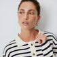 Maglione a righe con colletto polo