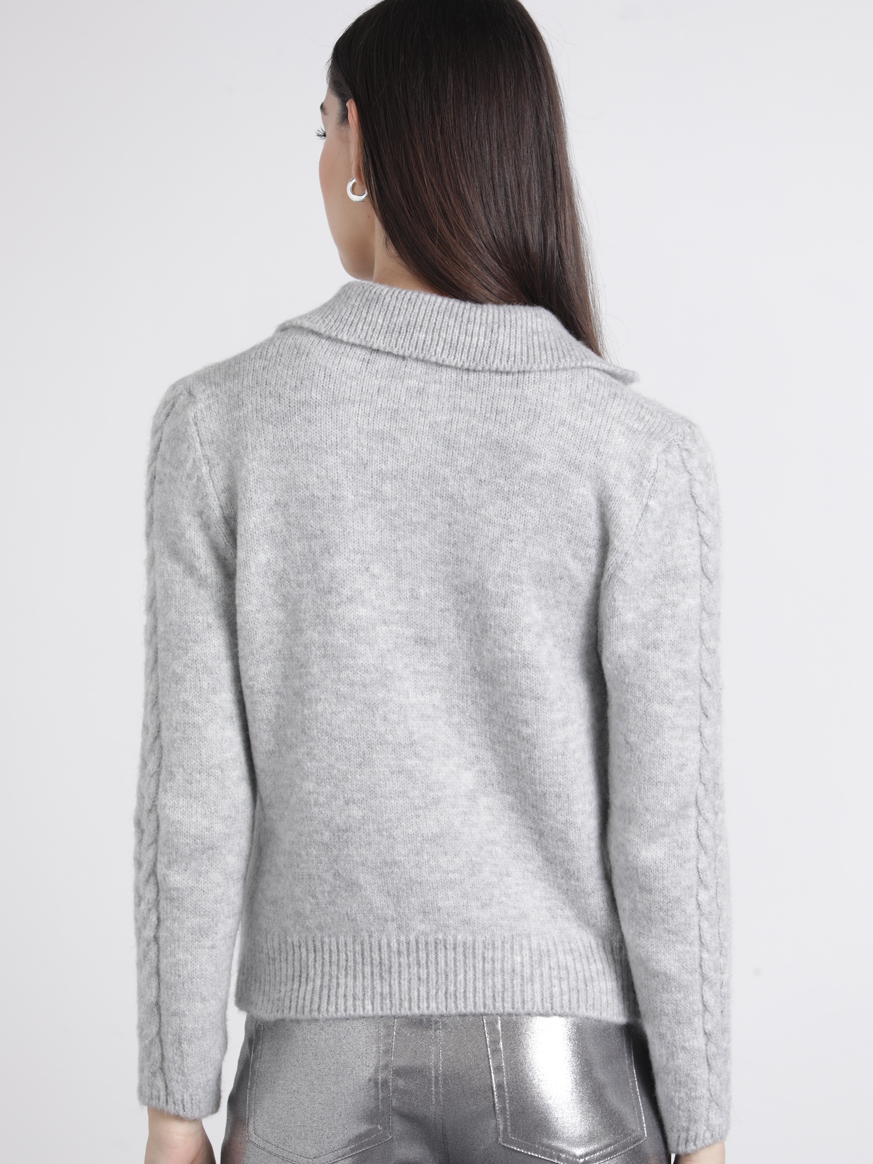Polo in maglia con maniche a treccia