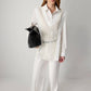 Maglia stratificata in pizzo con scollo a V