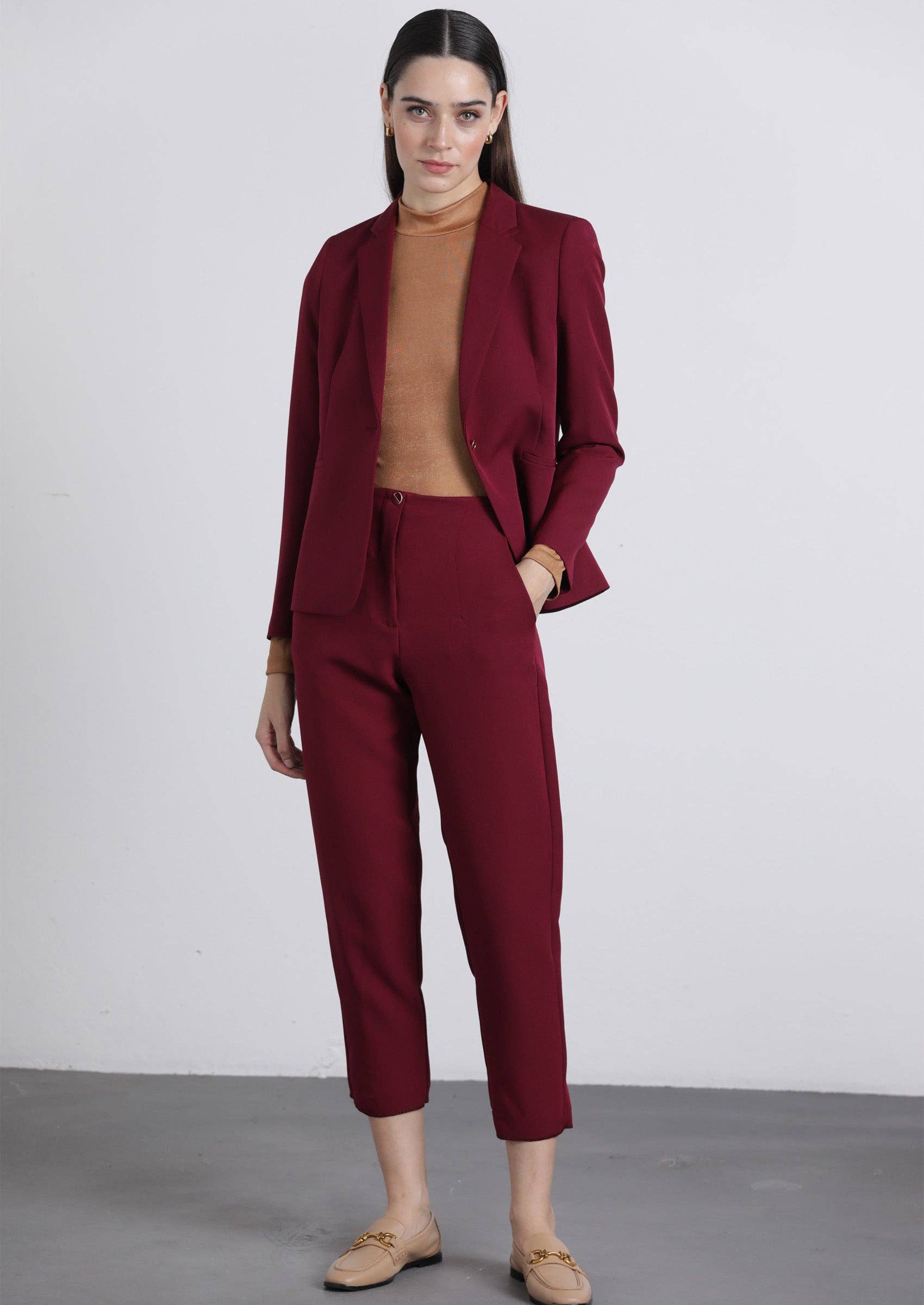 Pantaloni cropped bordeaux con bottoni dorati