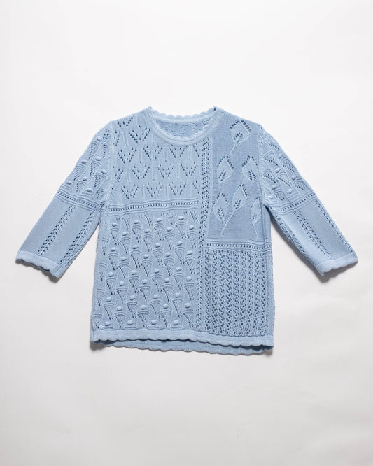 Maglia traforata in cotone con motivo floreale