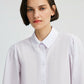 Camicia bianca con maniche plissettate