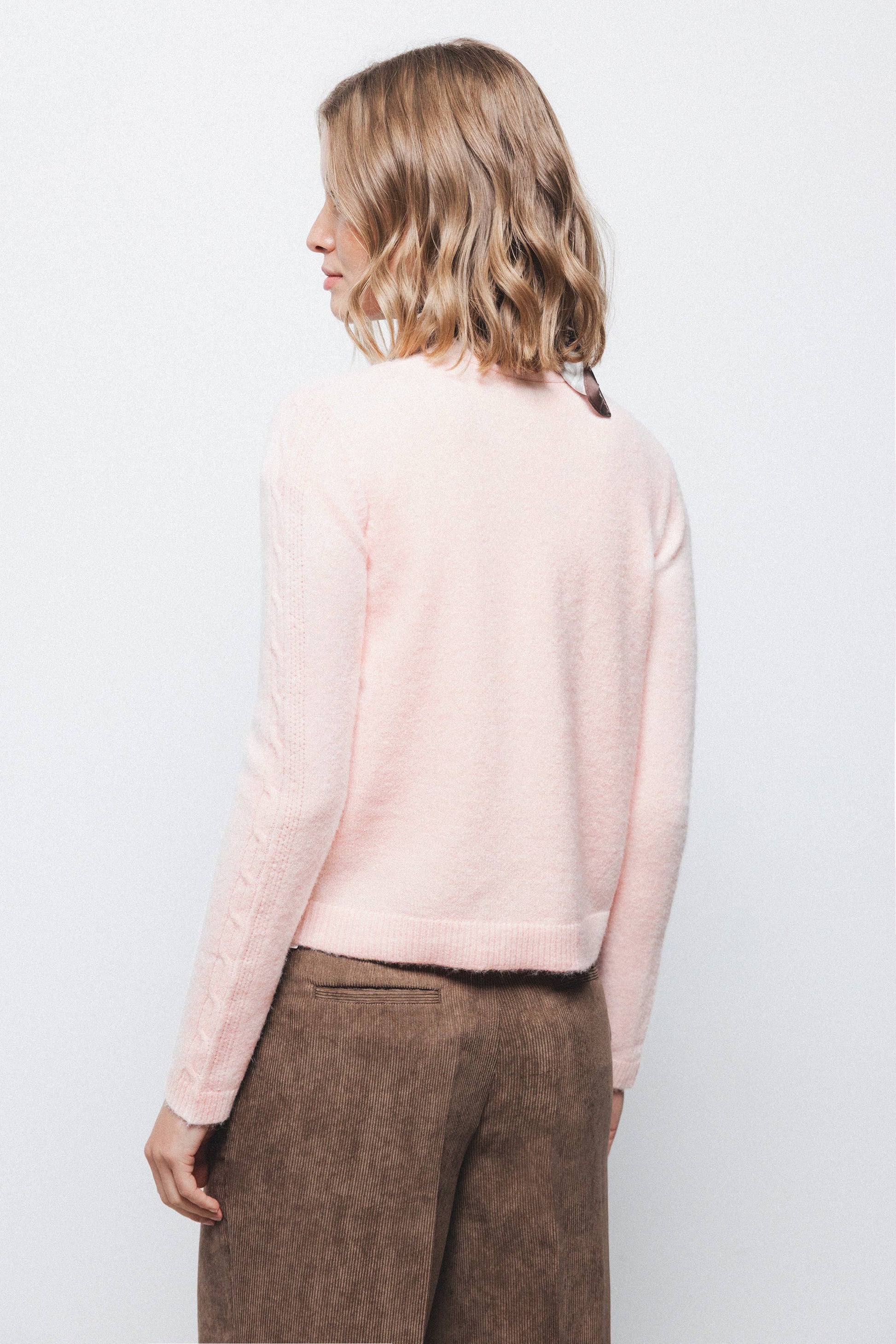 Giacca in maglia con pietre a contrasto