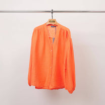 Blusa testurizzata con bottoni e scollo a V