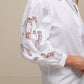 Blusa in cotone con maniche ricamate