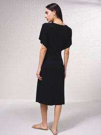 Abito midi in maglia a coste con maniche fluide