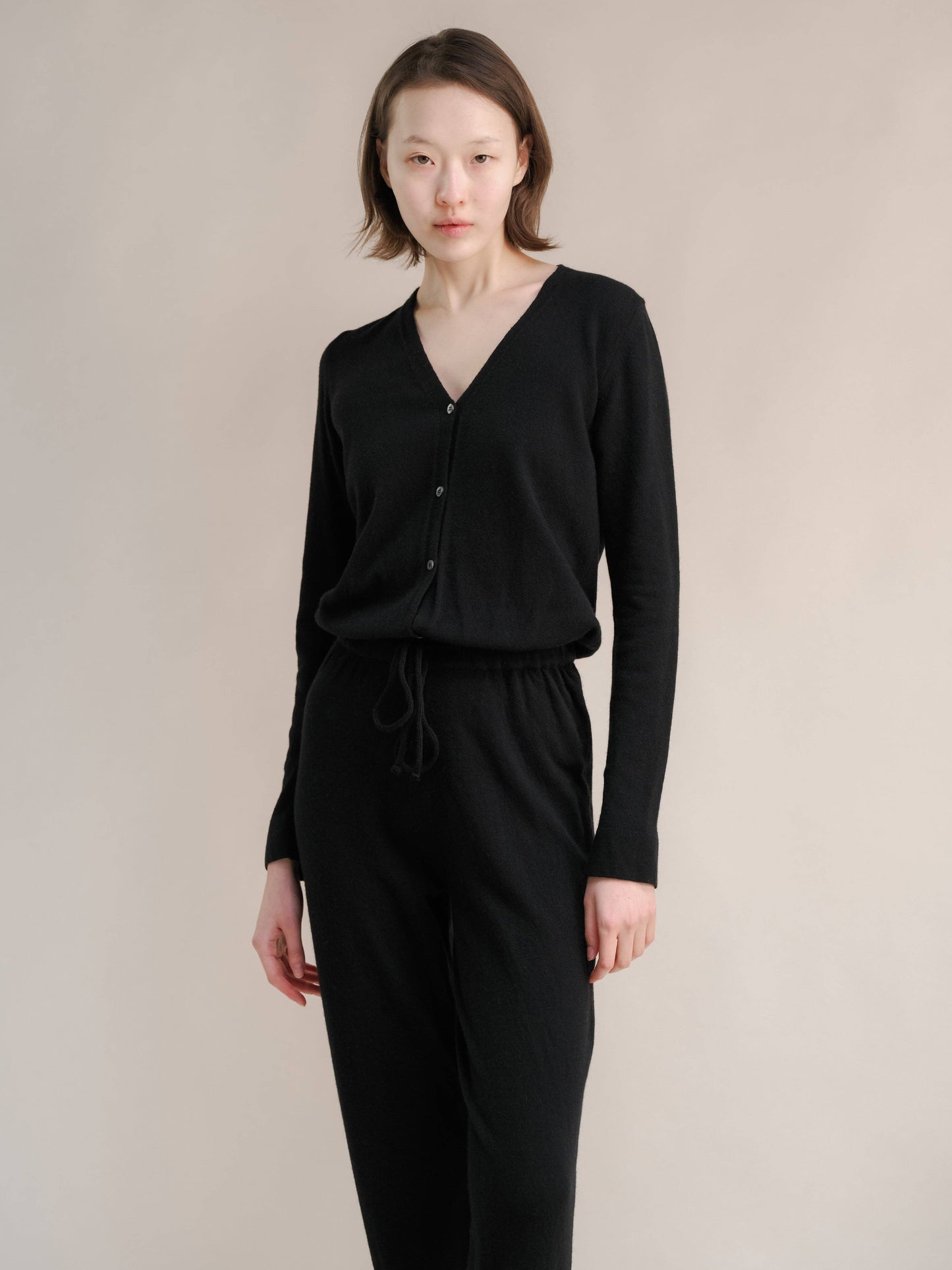 Tuta in misto cashmere con scollo a V