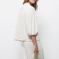 Blusa con pieghe e maniche a palloncino