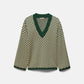 Maglione jacquard geometrico con scollo a V