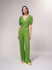 Tuta lunga a gamba larga con scollo a V e cut-out