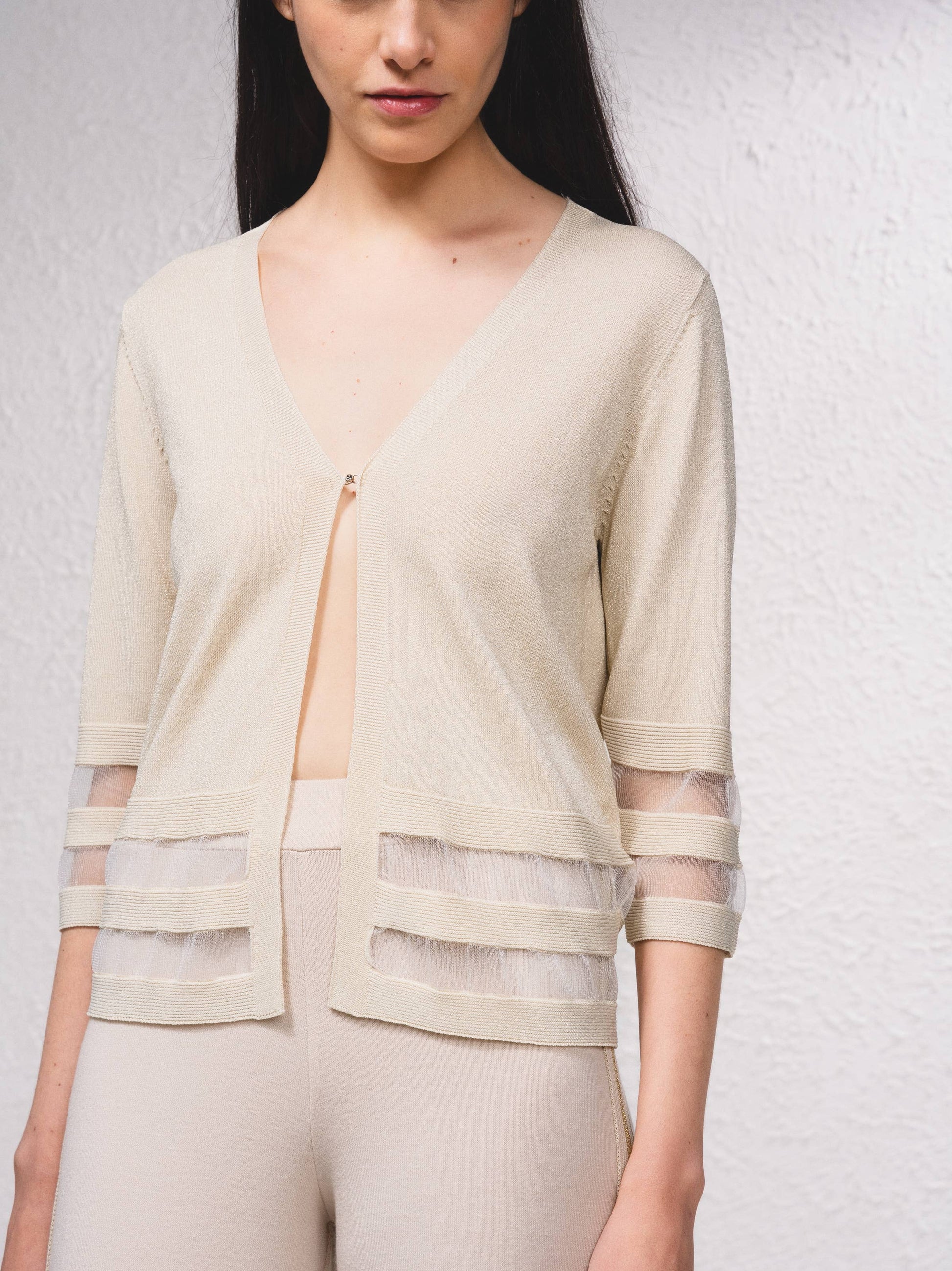 Giacca corta in maglia lurex con trasparenze