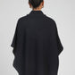 Poncho in maglia blu navy con collo alto