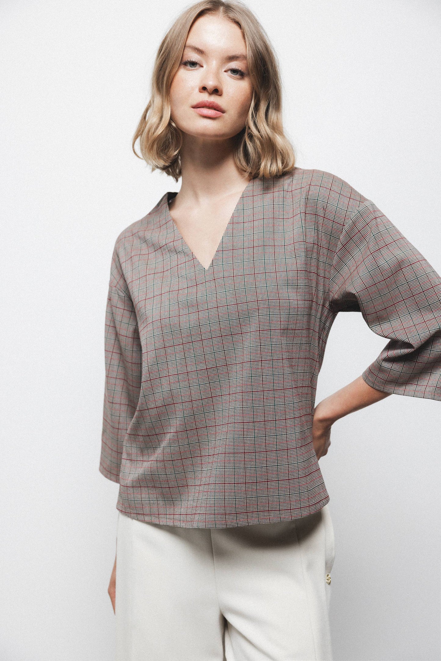 Blusa Principe di Galles con scollo a V