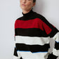 Maglione tunica a righe con collo alto