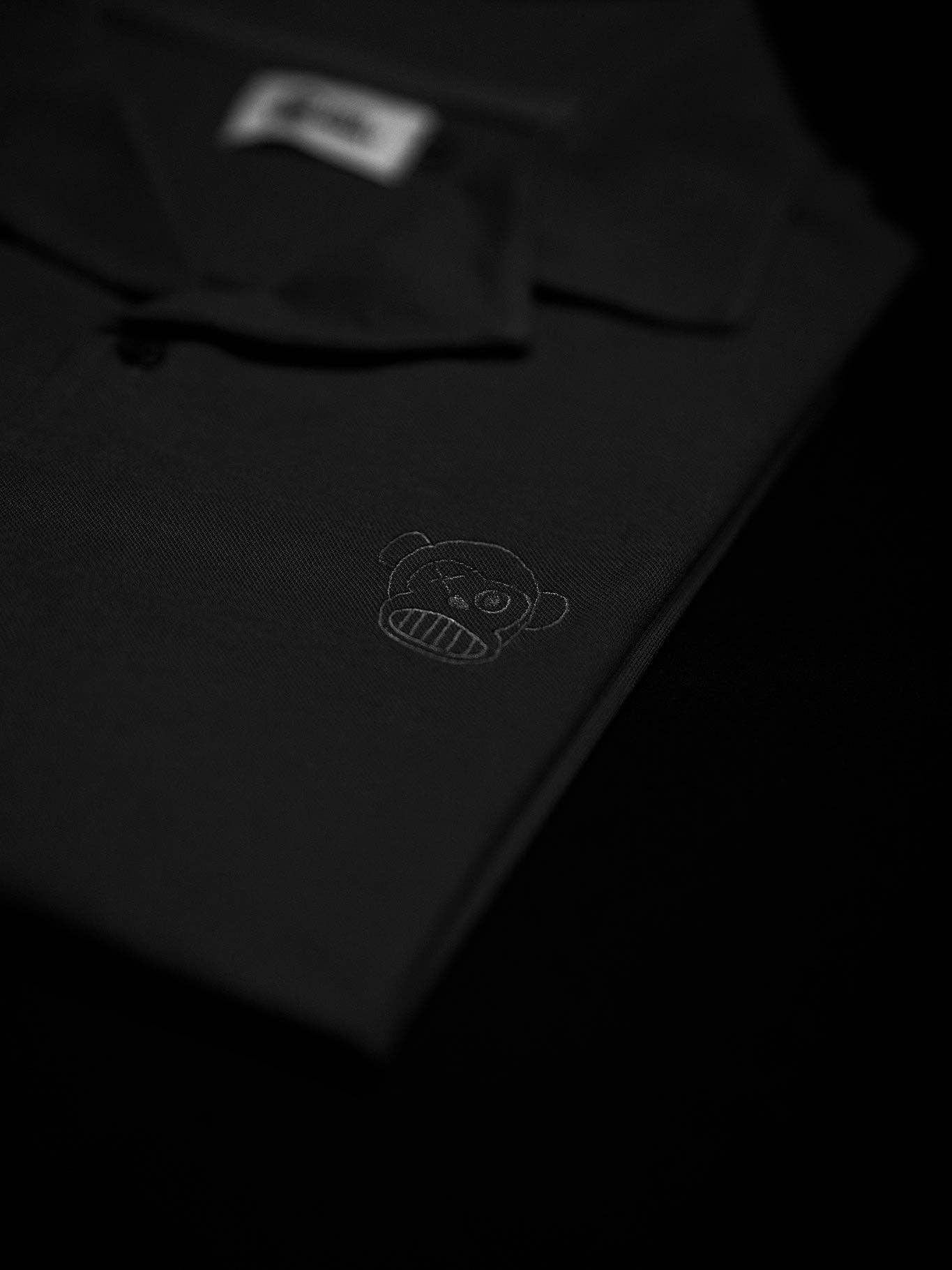 Camicia unisex in cotone piqué nera con logo ricamato