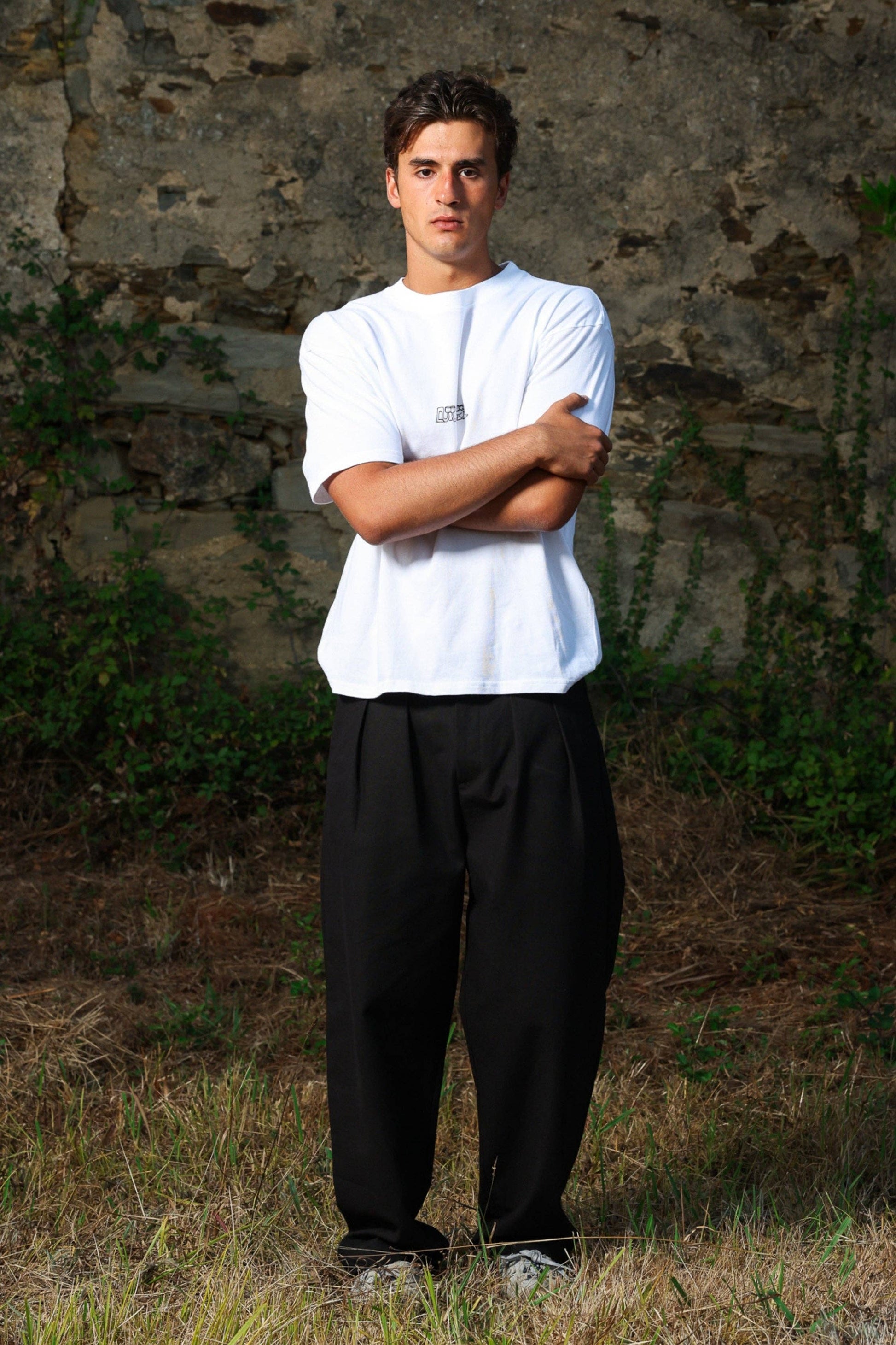 Pantaloni chino neri relaxed fit con pinces
