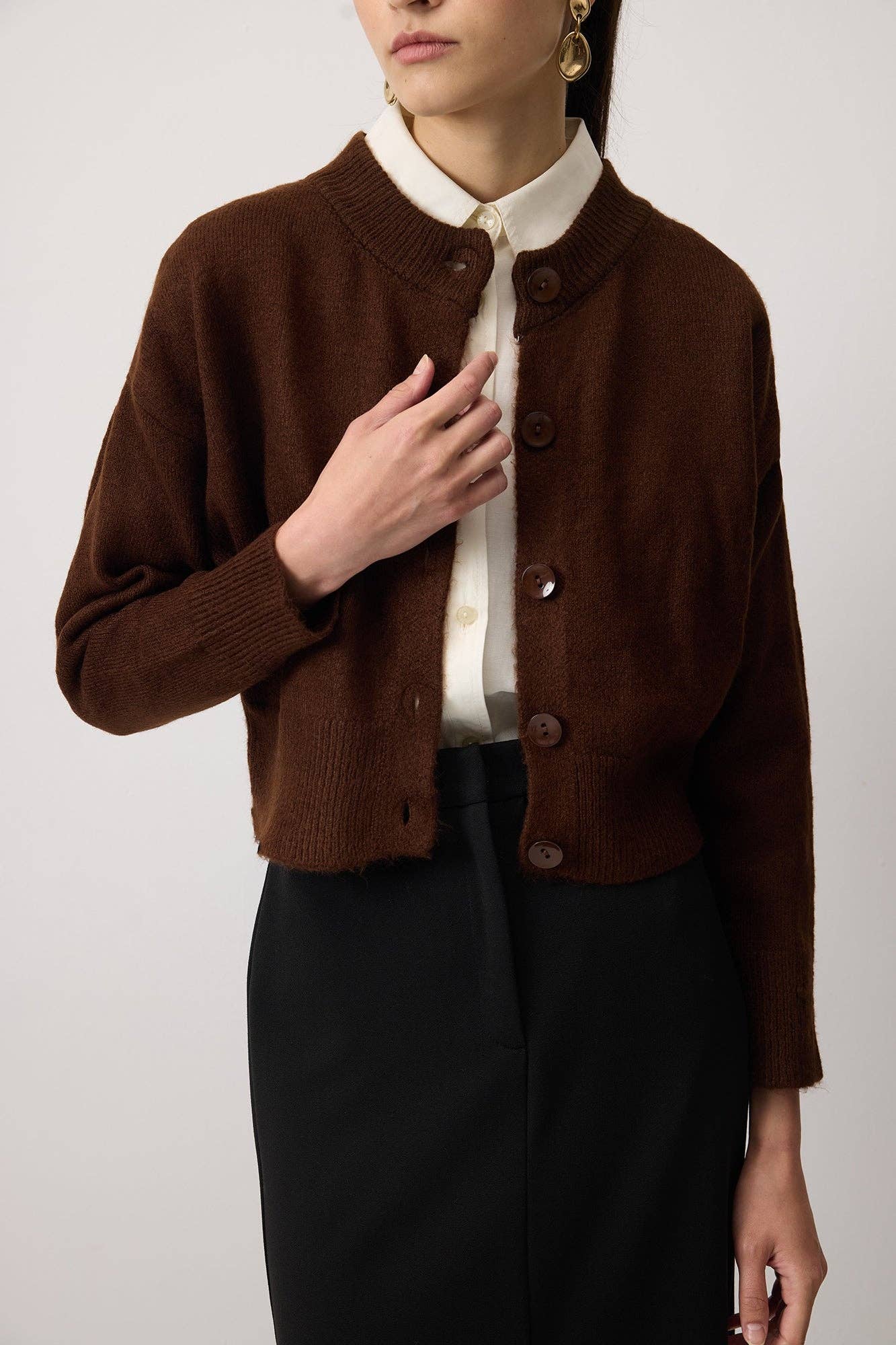 Cardigan corto in maglia con bottoni