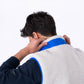 Gilet sherpa unisex avorio e blu con zip