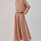 Completo in tweed con giacca corta e gonna lunga