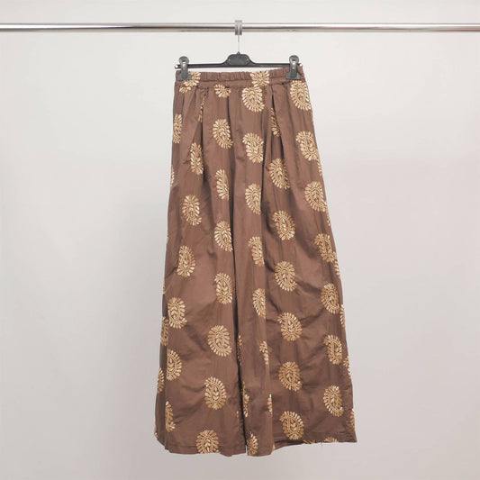 Pantaloni palazzo con ricami floreali