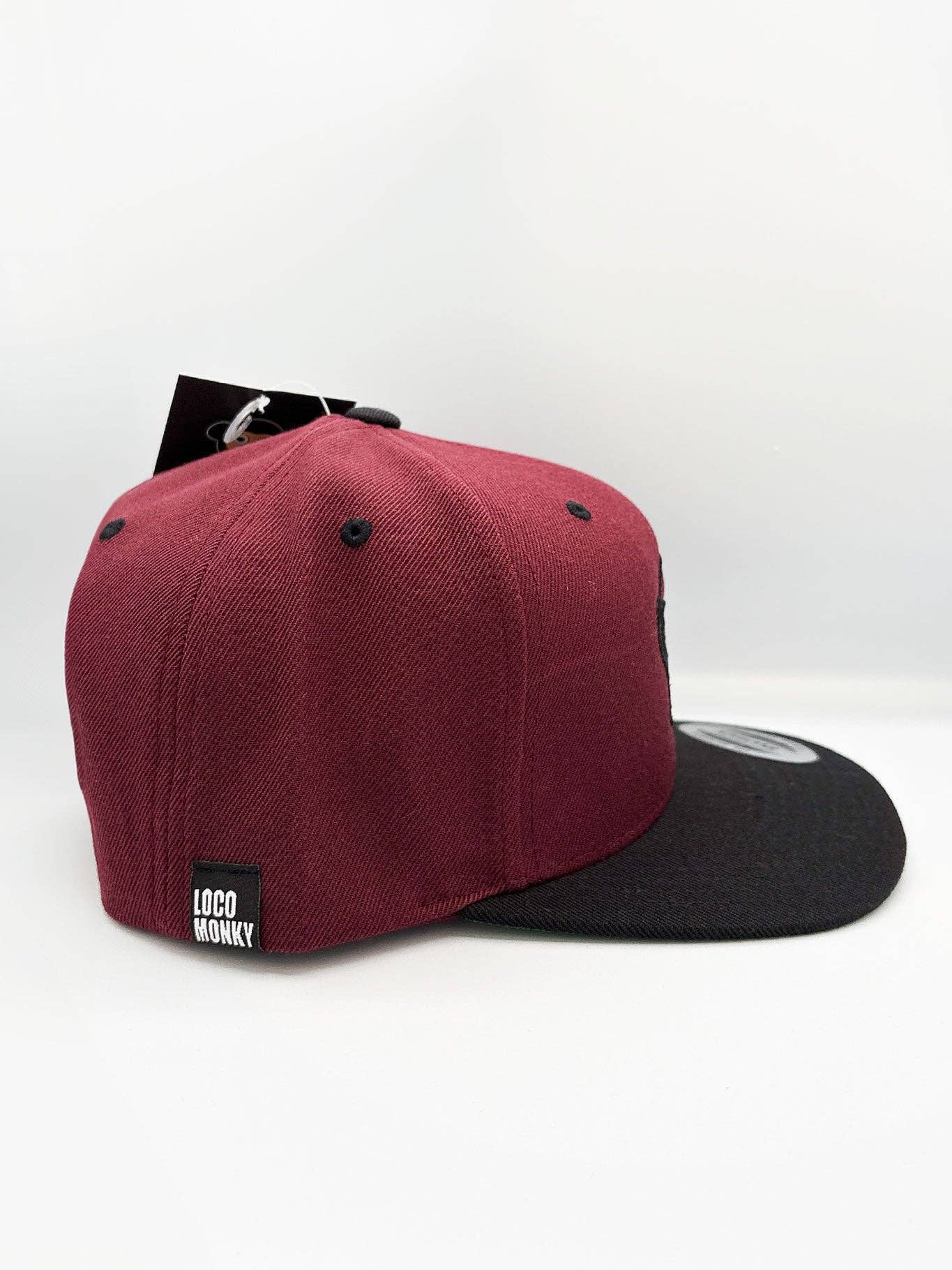 Cappellino snapback bicolor con logo ricamato