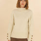 Maglione dolcevita in maglia Matis con polsini a bottoni