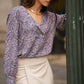 Blusa stampata floreale con scollo a V