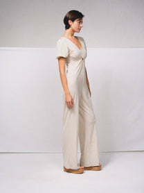 Tuta lunga a gamba larga con scollo a V e cut-out