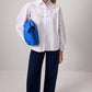 Camicia bianca con ricamo sangallo e maniche a sbuffo