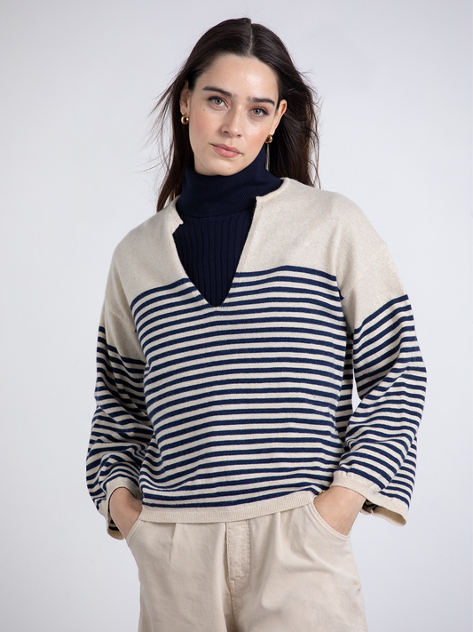 Maglione a righe bicolore con scollo a V