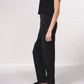 Pantaloni dritti con bottoni decorativi e vita elasticizzata