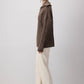 Maglione in maglia a trecce con zip e colletto ampio