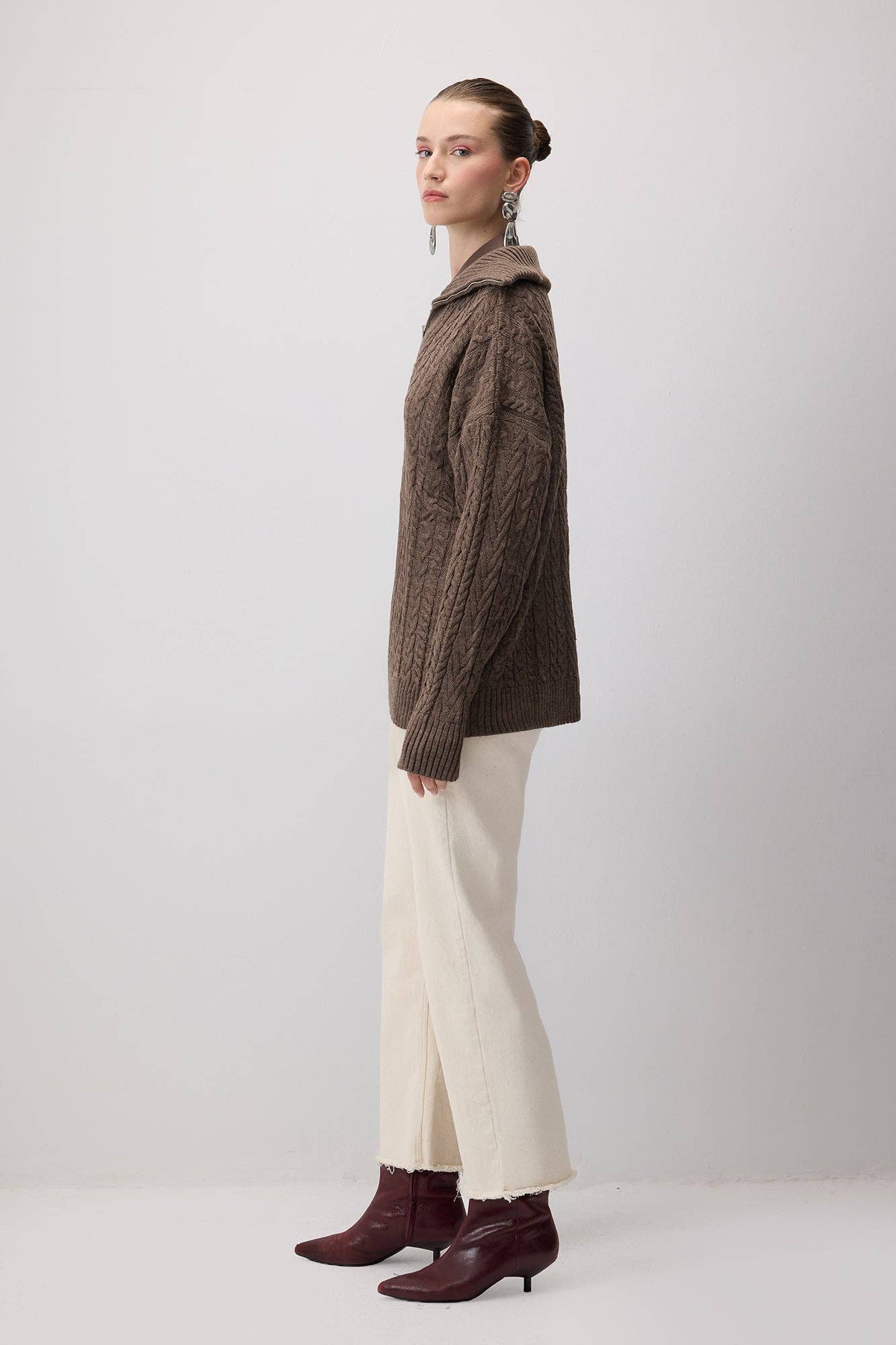 Maglione in maglia a trecce con zip e colletto ampio