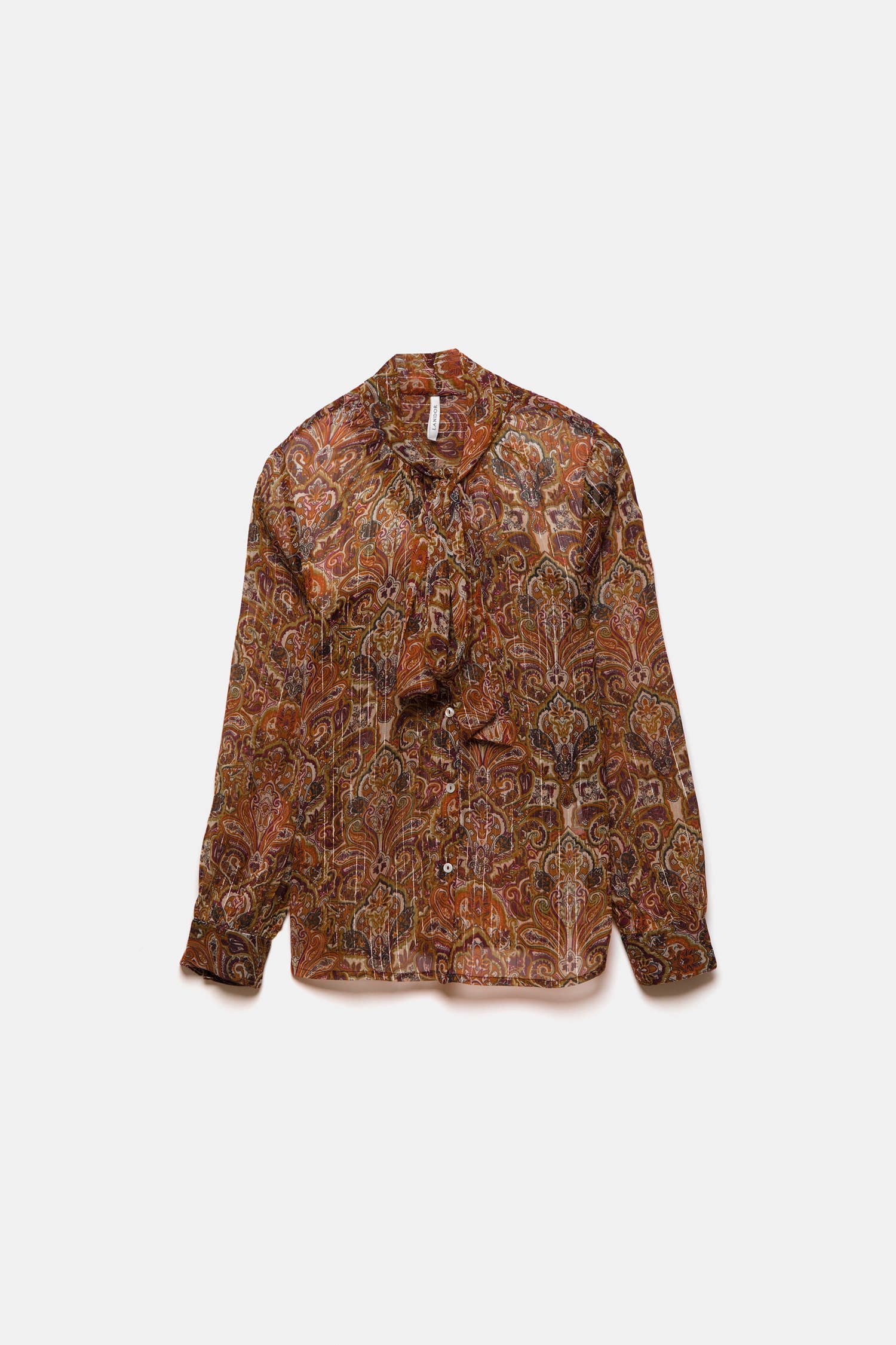 Blusa semitrasparente fantasia con fiocco al collo