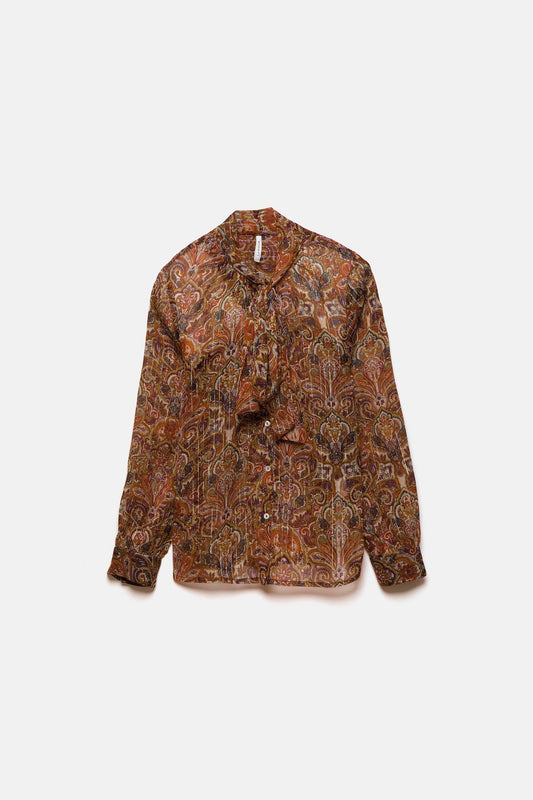 Blusa semitrasparente fantasia con fiocco al collo
