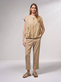 Gilet oversize beige con zip e tasche frontali