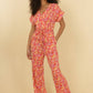 Tuta jumpsuit Clementine con stampa tropicale