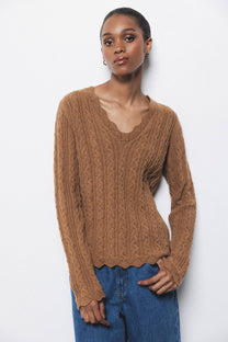 Maglione in lana a trecce con scollo a V