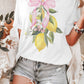 T-shirt oversize limone con fiocco rosa