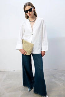 Giacca bianca in cotone con bottone