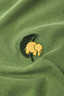 T-shirt pigmentata Confitera verde con stampa palmata