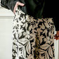Pantaloni a palazzo Petunia con stampa floreale