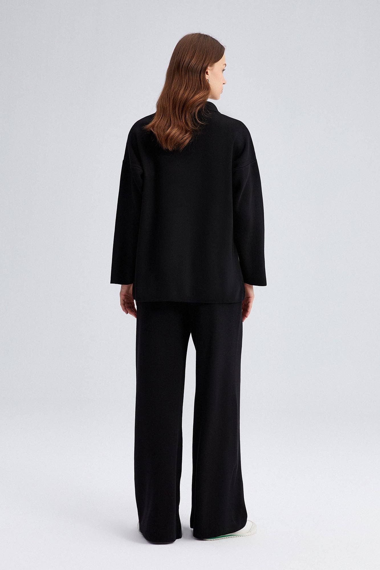 Set tunica e pantaloni in maglia con colletto