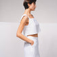 Top corto in lino con spalline arricciate