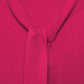 Maglione in maglia rasata con fiocco e scollo a V
