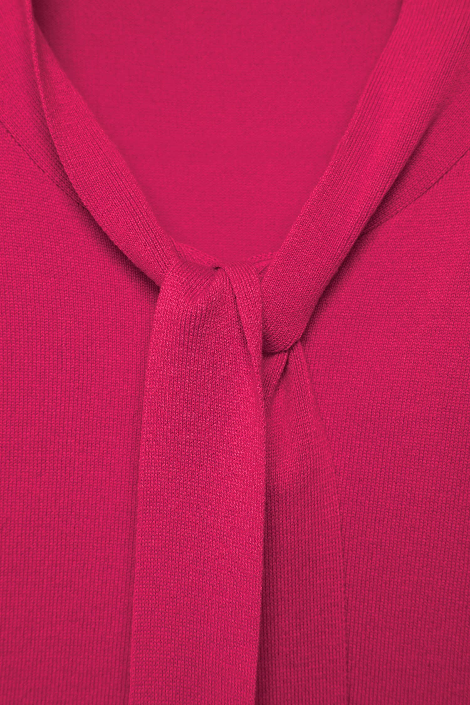 Maglione in maglia rasata con fiocco e scollo a V