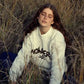 Maglione beige Nowhere in cotone biologico